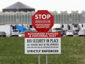 A warning sign posted at the east entrance to Nature Fresh Farms at on Wednesday, July 1, 2020.