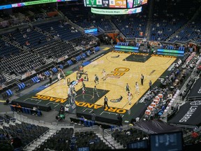 Empty seats are seen due to limited capacity restrictions during the pandemic in a NBA basketball game between the Milwaukee Bucks and Orlando Magic at Amway Center on January 11, 2021 in Orlando, Florida.