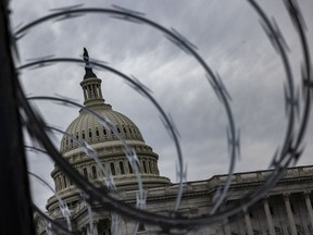 Razor wire is seen after being installed on the fence surrounding the grounds of the U.S. Capitol on January 15, 2021 in Washington, DC. Due to security threats following last week's storming of the U.S. Capitol by a pro-Trump mob, law enforcement agencies have increased security measures along the National Mall and much of downtown Washington, DC, essentially closing down the Mall a week ahead of President-elect Joe Biden's inauguration.