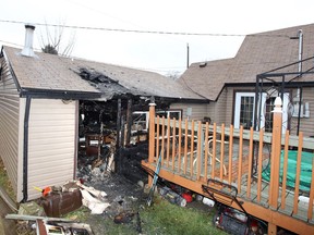 Windsor, Ontario. January 15, 2021. Damage to a garage and deck on the 1700 block of South Cameron Friday. (NICK BRANCACCIO/Windsor Star)