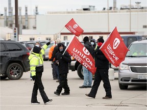 A judge has denied FCA Canada's request for an immediate injunction on picketing outside the Windsor Assembly Plant. Shown Friday, Jan. 8, 2021, Unifor Local 444 members blockade the plant at the Walker Road shipping yard.