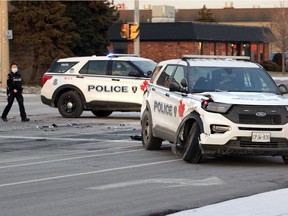 Windsor police at the scene of a collision involving a marked Windsor Police Service Ford SUV vehicle (shown in front) and a Ram 1500 pickup truck at the Ouellette Avenue and Eugenie Street intersection late Wednesday afternoon, Jan. 20, 2020. Eugenie Street traffic was detoured while the crash scene was cleared.