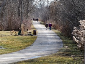 In this Jan. 21 file photo, walkers and hikers travel along the City of Windsor's Ganatchio Trail. The city is poised to purchase land for a new linear trail.