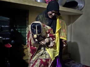A 15-year-old Bangladeshi is dragged onto a bed to pose for photos on the day of her forced wedding to a 32-year-old man. Canada is leading an international effort to ban child marriages, but still allows underage marriages in Canada under some circumstances.