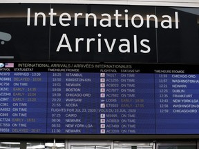 International arrivals are posted at Toronto Pearson International Airport, July 22, 2020.