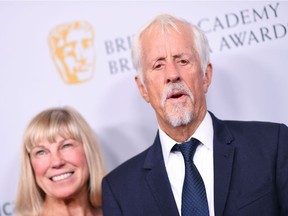 n this Oct. 25, 2019, photo, English director Michael Apted and his wife Paige Simpson arrive for the 2019 British Academy Britannia (BAFTA) awards at the Beverly Hilton hotel in Beverly Hills.