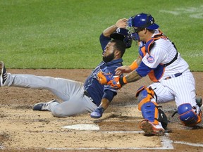 Catcher Wilson Ramos, who is seen tagging out Tampa Bay's Manuel Margot (13) for the New York Mets in a game last season, has signed with the Detroit Tigers.