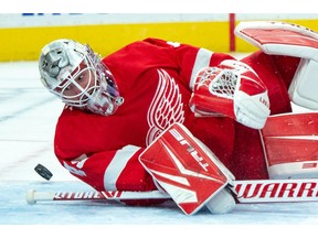 Detroit Red Wings goaltender Jonathan Bernier watches the puck miss the net against the Carolina Hurricanes at Little Caesars Arena.