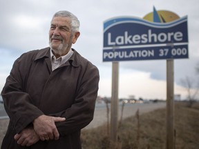 Tom Bain, mayor of the Municipality of Lakeshore, is pictured next to a Lakeshore sign on County Road 22 on Thursday, Dec. 31, 2020. Bain has announced he is running for a fifth term in October.