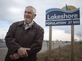 Tom Bain, Mayor of the Municipality of Lakeshore, is pictured next to a Lakeshore sign on County Road 22, Thursday, Dec. 31, 2020.  The Town of Lakeshore is now the Municipality of Lakeshore.