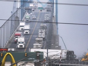 Traffic is shown on the Ambassador Bridge in Windsor, ON. on Tuesday, January 12, 2021.