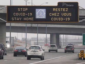 A province of Ontario sponsored sign above the Herb Gray Parkway urging people to stay home and stop Covid-19 is shown on Tuesday, January 12, 2021 in Windsor, ON.