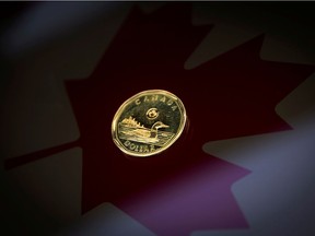 A Canadian dollar coin, commonly known as the "Loonie", is pictured in this illustration picture taken in Toronto Jan. 23, 2015.