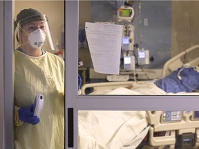 Local COVID-19 case count is declining, the local health unit reported Thursday. Suited up in protective gear, nursing student Bailey Zilliges is shown Jan. 18, 2021, caring for a COVID-19 patient in the Windsor Regional Hospital Met campus ICU.