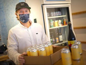 Pandemic pivot. Mike Weber, co-owner of Pressure Drop, is now providing liquor sales to help with the bottom line during the latest lockdown. He's shown at the Ford City business on Friday, Jan. 15, 2021.