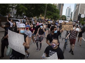 Hundreds marched throughout downtown Windsor Saturday, June 7, 2020, as protests continue for police reform in the wake of the killing of George Floyd.