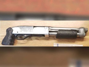 An evidence photo provided by Windsor police showing a loaded pump-action sawed-off shotgun that officers seized from a suspect on Jan. 12, 2021.