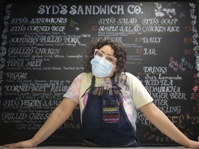 Sydney Filiault, owner of Syd's Sandwich Co. on Pelissier Street in downtown Windsor, is involved with DineYQG, a new local initiative that helps restaurant owners pivot their business and offers diners rewards for supporting local.