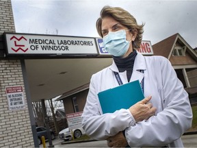 Faster answers for local patients. Jennifer Yee, vice-president of Medical Laboratories of Windsor, is shown Monday, Jan. 18, 2021, on the first day of local COVID-19 testing.