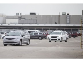 Newly built Chrysler Pacificas are driven off the lot at the Windsor Assembly Plant after a blockade by Uniform members was removed, Monday, January 11, 2020. The plant will remain on shutdown until mid-July due to the ongoing computer chip shortage.