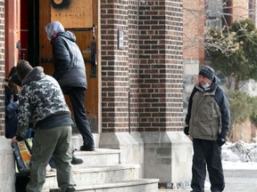 Windsor, Ontario. February 12, 2021. Front doors to the Downtown Mission were busy Friday.   (NICK BRANCACCIO/Windsor Star)