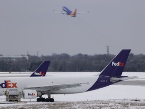 FedEx airplanes are parked at Nashville International Airport on February 16, 2021 in Nashville, Tennessee. Major winter storms have swept across 26 states with a mix of freezing temperatures and precipitation.