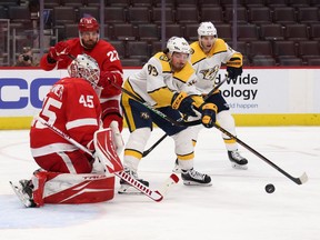 Matt Duchene of the Nashville Predators tries to get off a third period shot on Jonathan Bernier of the Detroit Red Wings at Little Caesars Arena on February 23, 2021 in Detroit, Michigan.