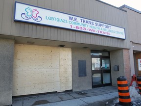 Barricades and boarded-up windows at W.E. Trans Support in Windsor following incidents of targeted vandalism. Photographed Feb. 23, 2021.