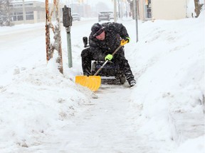 "Don was a special guy," said Mayor Drew Dilkens. Don Hamel is shown Feb. 9, 2018, clearing snow from the seat of his mobility scooter along a stretch of Erie Street East sidewalk.
