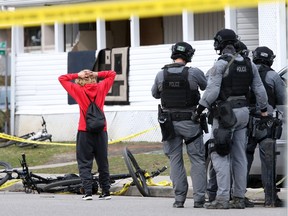 Despite a decline in the overall crime rate in Windsor last year, city police say 2020 saw a surge in violent crimes locally, with the pandemic likely a reason for the uptick. In this March 26, 2020, photo, Windsor police ESU members arrest a woman in the 800 block of Mercer Avenue during a lengthy standoff.