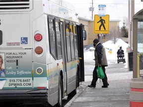 A Transit Windsor rider boards a nearly empty bus at Transit Windsor's Tecumseh Mall terminal Wednesday. NICK BRANCACCIO/Windsor Star
