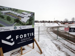 Construction is shown underway on Feb. 18, 2021, near the intersection of Victoria Street South and Simcoe Street in Amherstburg, where a new public high school is being built. A grassroots effort is underway to preserve part of the remaining park.