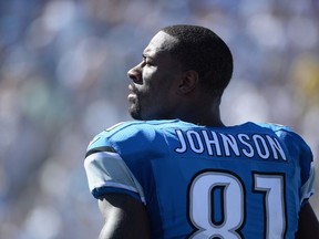 Wide receiver Calvin Johnson of the Detroit Lions stands on the sidelines while playing the San Diego Chargers at Qualcomm Stadium on September 13, 2015 in San Diego, California.