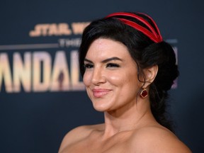 In this file photo taken on Nov. 13, 2019, American actress Gina Carano arrives for the Disney+ World Premiere of The Mandalorian at El Capitan theatre in Hollywood.