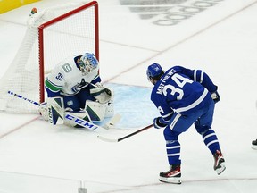 Toronto Maple Leafs forward Auston Matthews scores on Vancouver Canucks goalie Thatcher Demko to open scoring in the first period at Scotiabank Arena in Toronto.