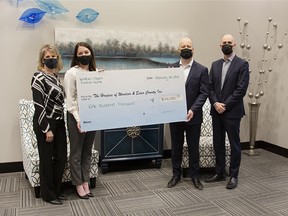 The Hospice of Windsor and Essex County received a cheque recently for $100,000 from Windsor Chapel.  From left:  Hospice executive director Colleen Reaume and Katharen Bortolin and Windsor Chapel's Scott Lockwood and Philip Janisse.