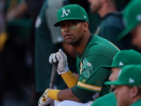 The Athletics have traded Khris Davis to the Rangers for Elvis Andrus, according to multiple reports Saturday, Feb. 6, 2021.