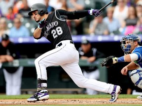 The Cardinals acquired Nolan Arenado from the Rockies,.