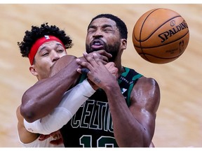 Feb 21, 2021; New Orleans, Louisiana, USA;  New Orleans Pelicans guard Josh Hart (3) knocks the ball from Boston Celtics forward Tristan Thompson (13) the during the second half at Smoothie King Center. Mandatory Credit: Stephen Lew-USA TODAY Sports