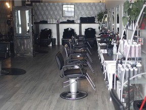 The pandemic that is hurting local businesses is also having a big impact on city hall coffers. Shown here on Feb. 3, 2021, the salon chairs are empty at Youssef Hair Boutique Inc., closed due to COVID-19 restrictions.