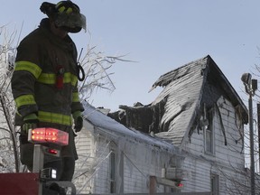 A Windsor firefighter is shown on the scene of a fatal fire in the 400 block of Church Street on Monday, Feb. 8, 2021.