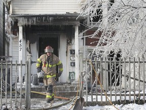 A Windsor firefighter is shown on the scene of a fatal fire in the 400 block of Church St. on Monday, February 8, 2021.