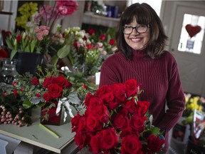 TECUMSEH, ONT:. FEBRUARY 12, 2021 - Kathy McCarthy, owner of Country Flower Shoppe, prepares flower Valentine's Day bouquets, Friday, Feb. 12, 2021.