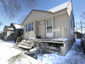 Damaged is shown to the porch on a home in the 1800 block of George Ave. in Windsor, ON. on Thursday, February 11, 2021. A motorist struck the home Wednesday evening.