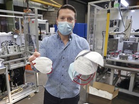 "Getting great feedback." Andrew Glover, co-owner of Harbour Technologies, displays some of the company's N95 masks at the Windsor business on Jan. 27, 2021.