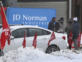 Members of Unifor Local 195 are shown on Monday, February 8, 2021, as they continued their blockade outside of JD Norman Industries on Hawthorne Drive in Windsor, ON.
