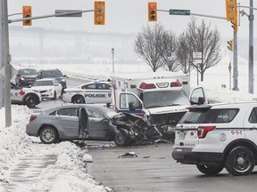 Windsor police are shown at the scene of a three vehicle collision on Riverside Dr. W. between Caron and Crawford on Thursday, Feb. 18, 2021.