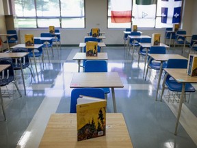 A classroom with social distancing measures in place is seen at St. Thomas of Villanova Catholic High School, as schools prepare to return in September during the COVID-19 pandemic, Thursday, August 6, 2020.