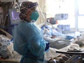 A nurse treats patients in a makeshift ICU in Torrance, California.