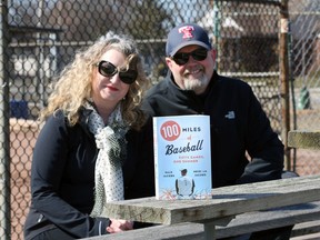 Heidi and Dale Jacobs have co-authored 100 Miles of Baseball, 50 Games, One Summer.  They were photographed at Optimist Park ball diamonds on Ypres Boulevard Friday, March 5, 2021.